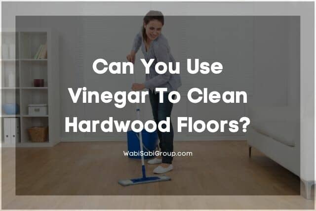 Woman cleaning hardwood floor