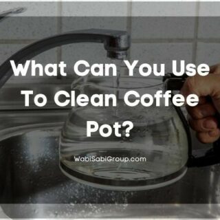 Cleaning coffee pot in sink