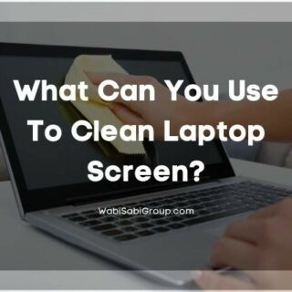 Wiping laptop screen with a wipe