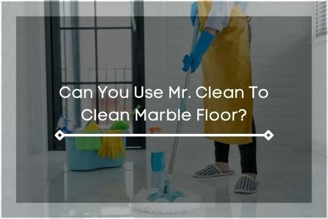 Person using mop to clean marble floor
