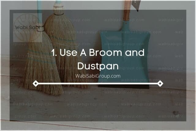 A photo of a broom and a dustpan