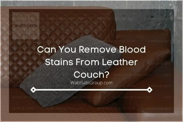 A photo of a leather couch with grey pillow