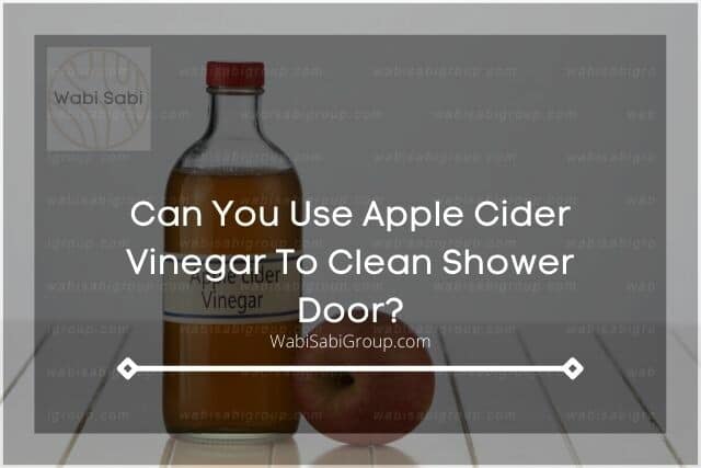 A photo of apple cider vinegar with apples on it